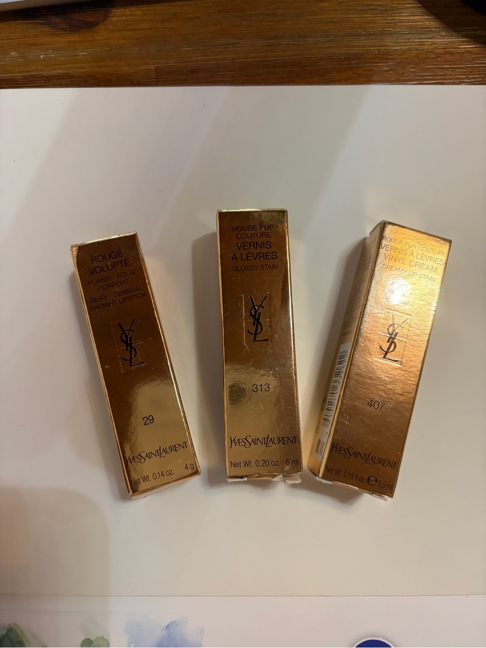 Yves Saint Laurent Gold Lipstick &lip stains (Shades 29, 313, 407)